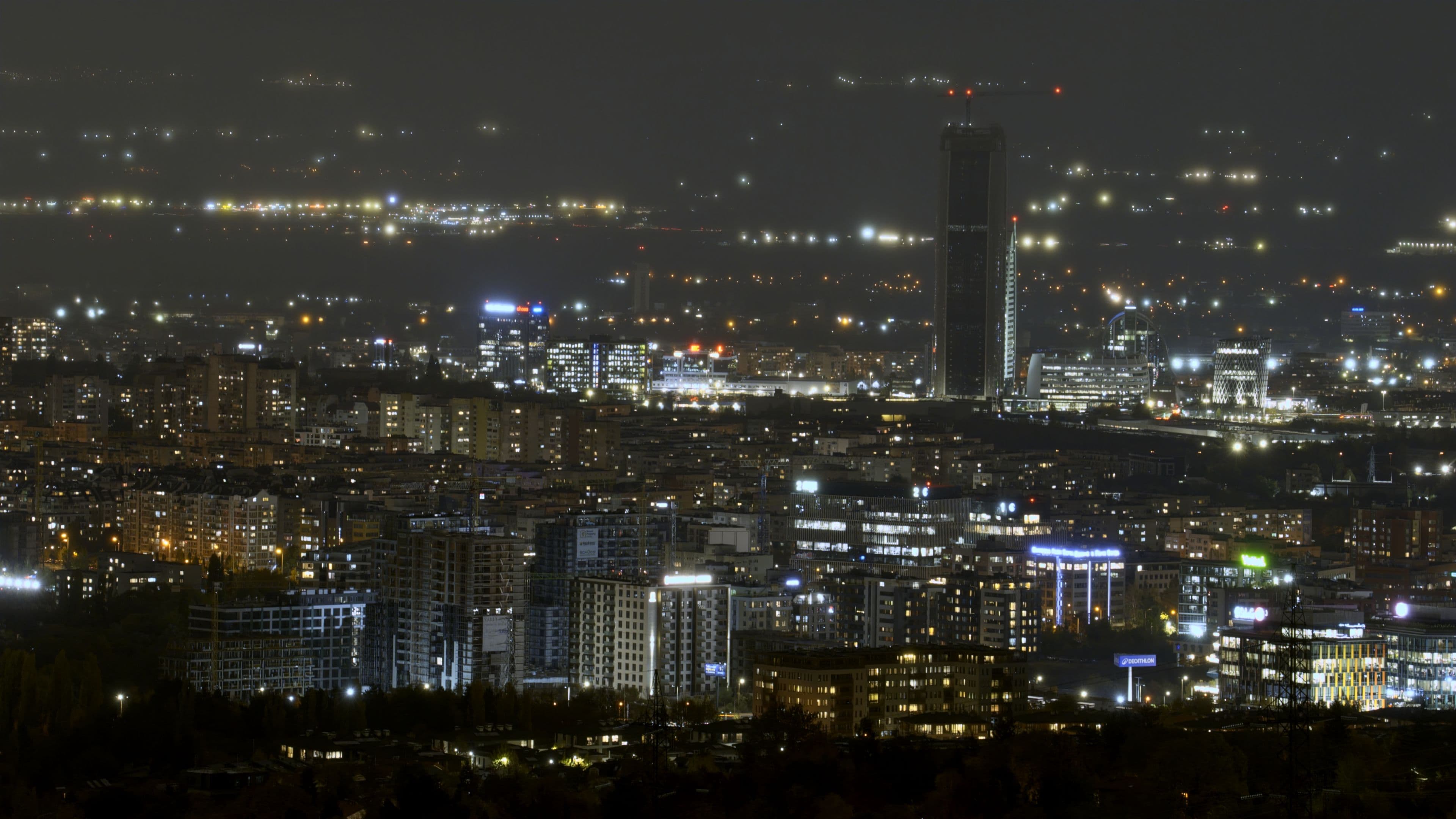 Rainy Sofia cityscape with a skyscraper in a foggy, misty weather
