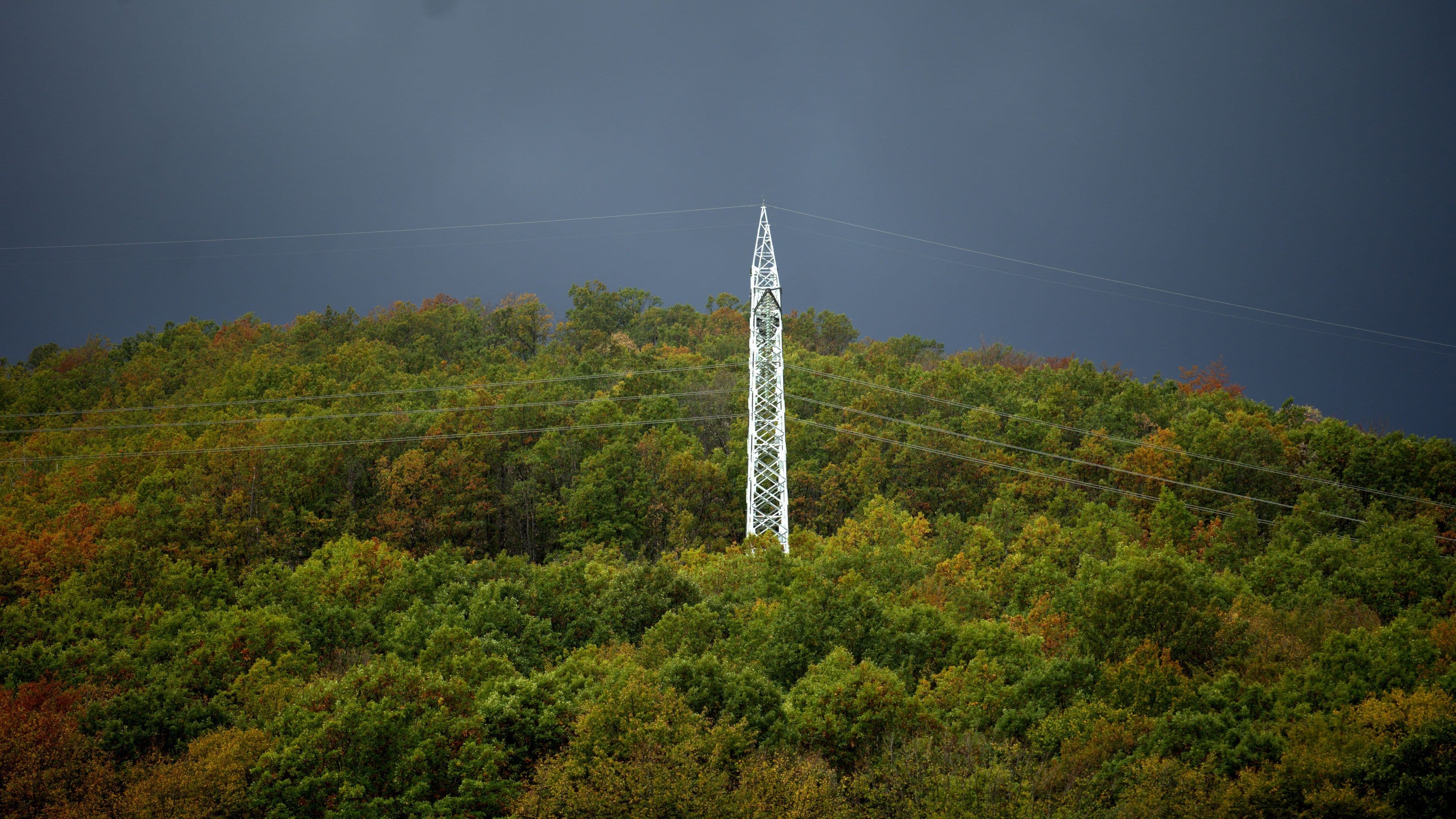 A lonely electric pole with the storm apporaching above the Bebresh dam