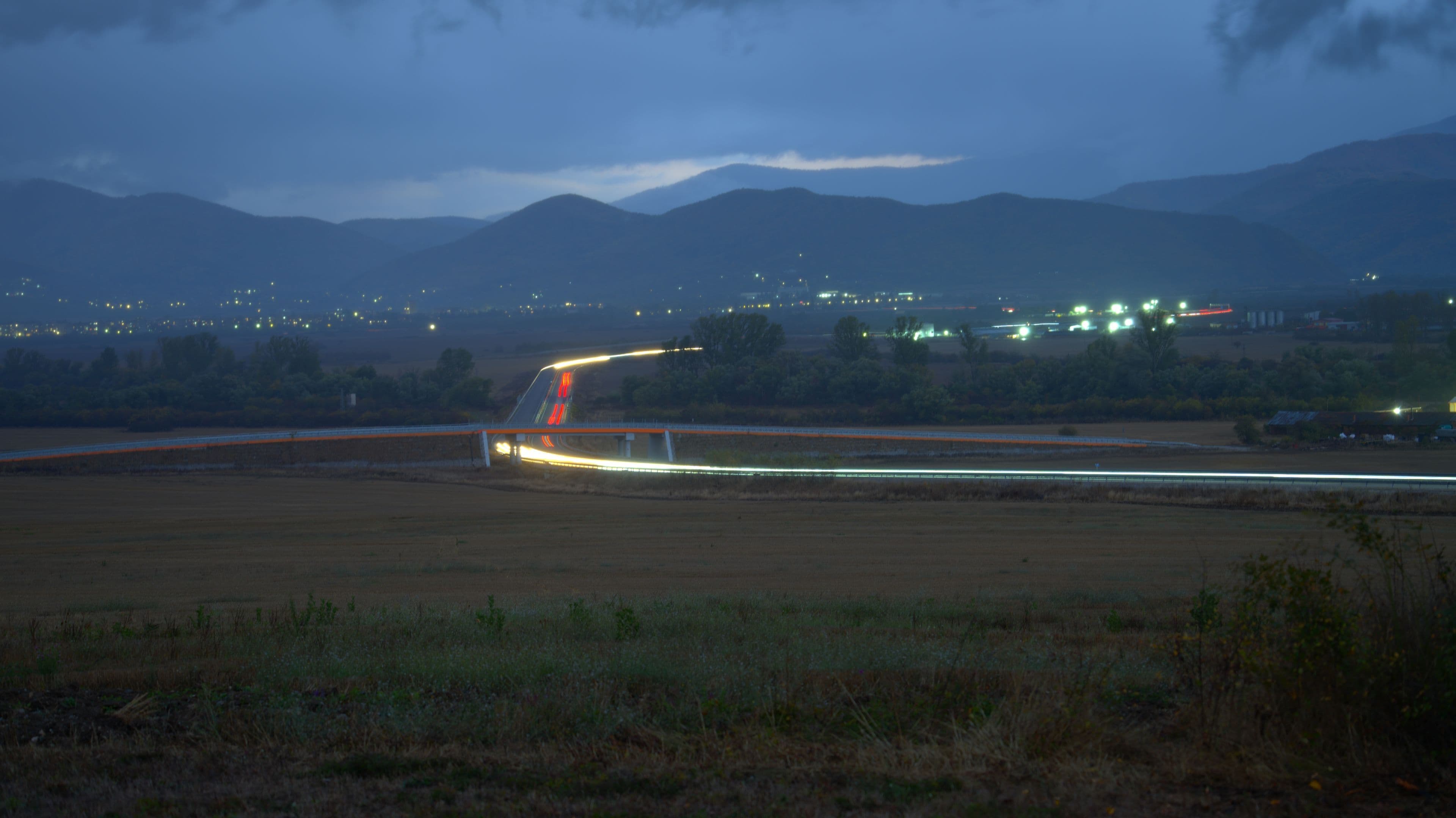 Late evening traffic in the rain on the Vidin-Botevgrad speedway near Skravena interchange