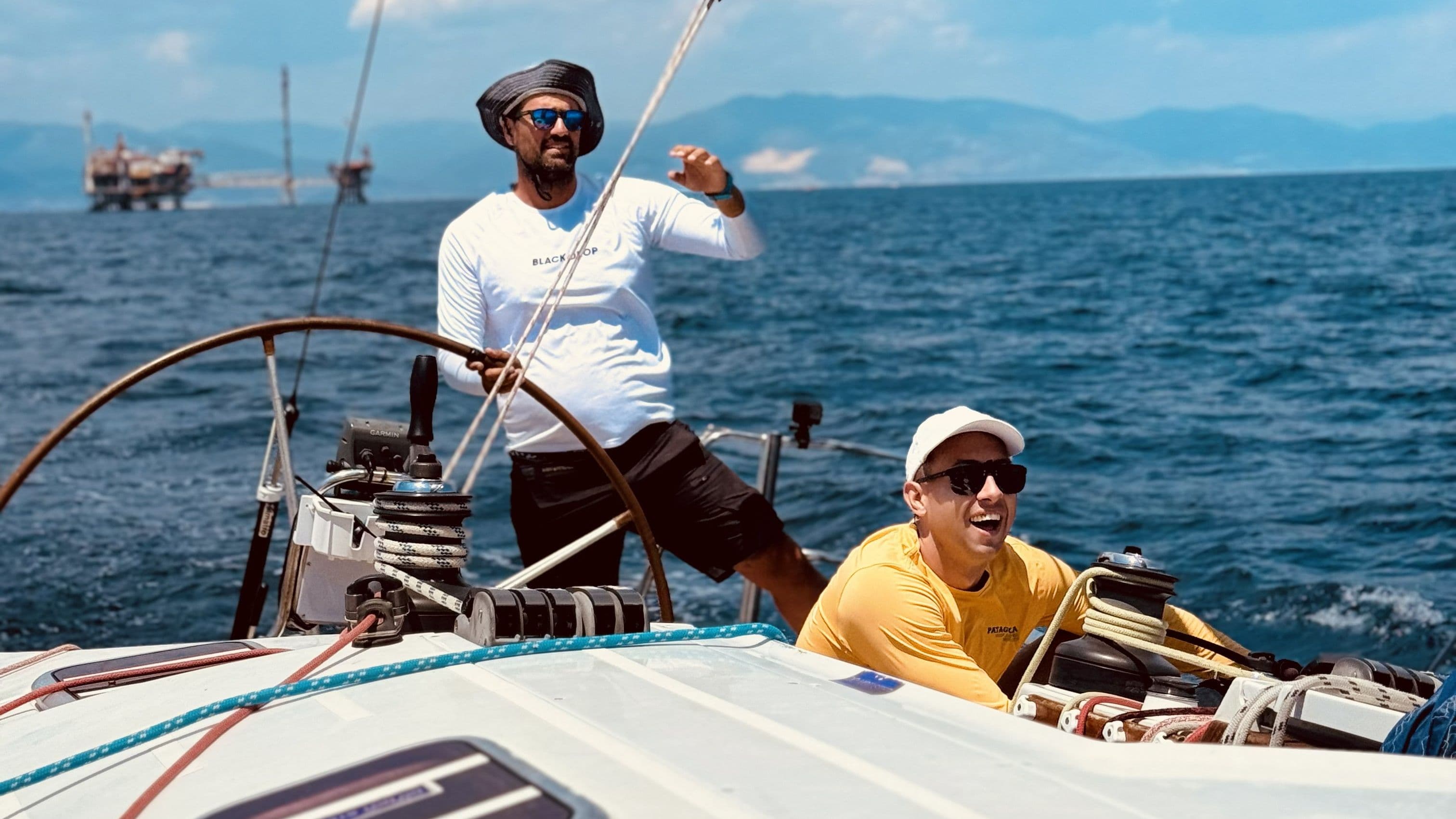Dimitris & Viktor steering the boat - helm and jib